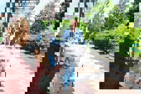 man smoking at a train station